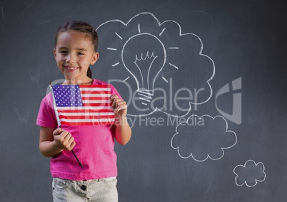 Composite image of smiling girl with a little american flag against blackboard with lightbulb and cl