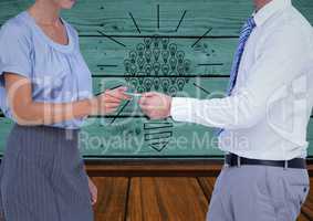 Composite image of Business people trading calling card against green wood wall with sketches