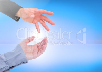 Composite Image of two Hands against a blue background