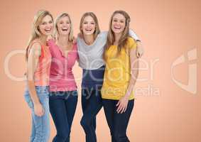 Girls Friends Hugging and smiling at camera against orange background