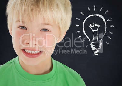 kid and blackboard with lightbulb against a black background