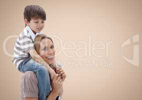 Mother and son against a neutral background