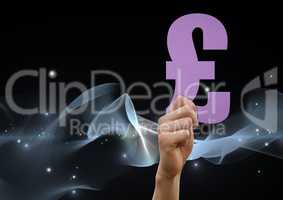 Composite image of Hand holding Pound Money against lights on dark background