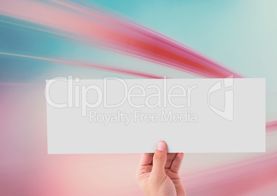 Composite image of Hand Holding white paper Note against colored background