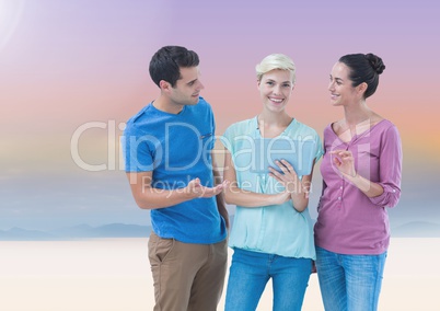 Happy Group of people using tablet against Bright background