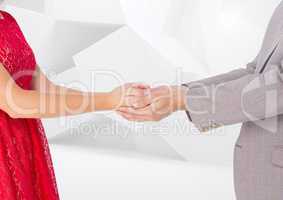 Composite Image of a Couple holding their hands against a white background