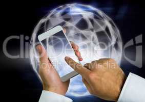 Composite image of Hand touching cell phone screen against bright graphic sphere