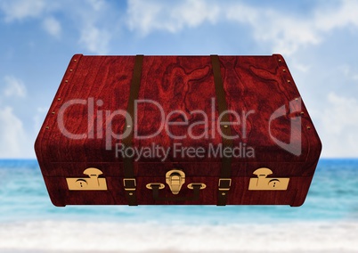 Composite Image of a wood Luggage against a sea background