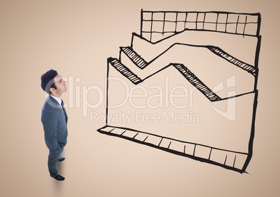 Businessman Standing looking at Graphic against a neutral background
