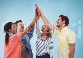 Group of Friends clapping each other hands against a blue background
