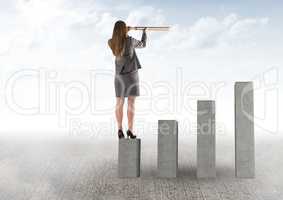 Businessman Standing on Graphic looking at future against a cloudy background
