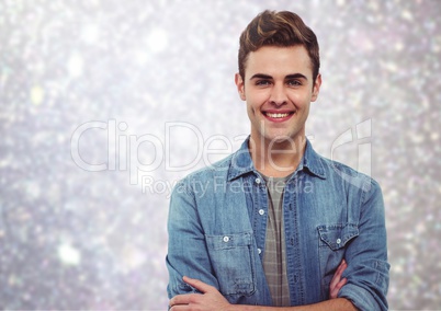 Composite image of happy young man smiling against bright background