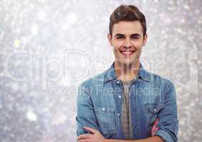 Composite image of happy young man smiling against bright background