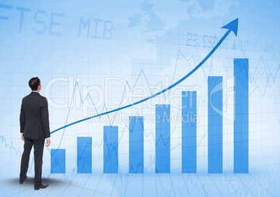 Composite image of Businessman Standing and looking at Graph