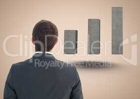 Composite image of Business man Standing looking at Graph against a neutral background