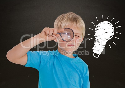 Composite image of Boy looking for an idea against blackboard with lightbulb