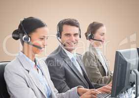 Composite image of Travel agents smiling against beige background