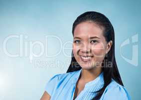 Happy Woman Smiling against a light blue Background