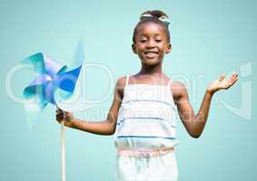 Happy Kid Girl having Fun against a light blue ackground