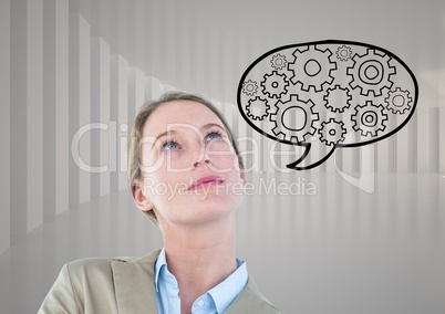 Businesswoman sketches on wall against a neutral background