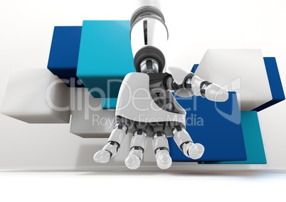 Composite Image of a robotic hand on blue cubes against a white background