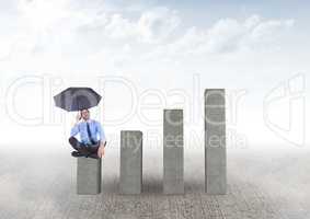 Businessman seating with an umbrella on graph against grey background