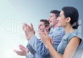 Group of People Clapping in their hands against a light blue background