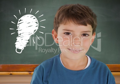 kid and blackboard with lightbulb against a black background