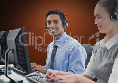 Travel agents with headsets against a brown background