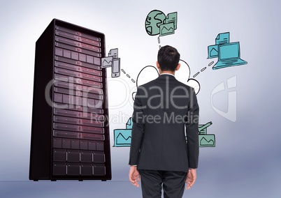 Businessman Standing looking at Graphic against a grey background