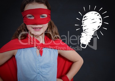 kid and blackboard with lightbulb against a black background