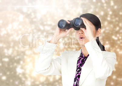 Businesswoman using binoculars against Sparkles light background