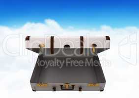 Composite Image of  a open Briefcase with Sky against a blue background