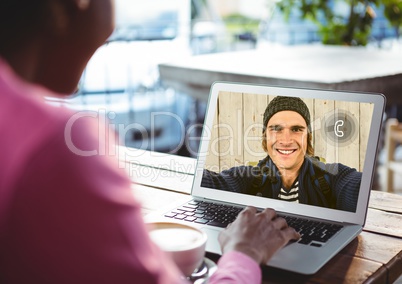 Woman having video call with man on laptop