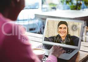Woman having video call with man on laptop