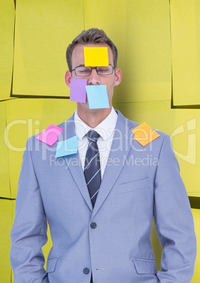 Businessman with blank note over his face
