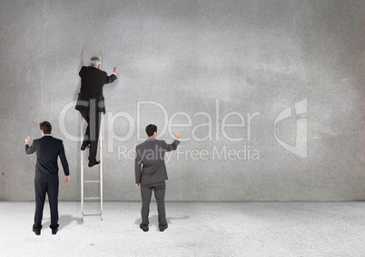 Business professionals writing against grey background