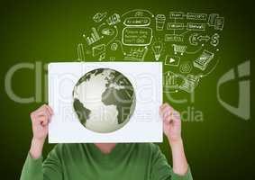 Man covering his face with card showing globe against green background