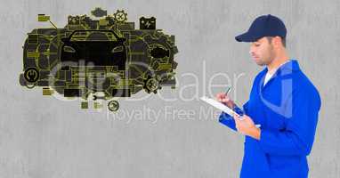 Automobile mechanic writing on clipboard and car interface in background