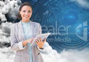 Portrait of businesswoman holding digital tablet with binary codes and clouds in background