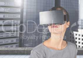 Executive using virtual reality headset against office building
