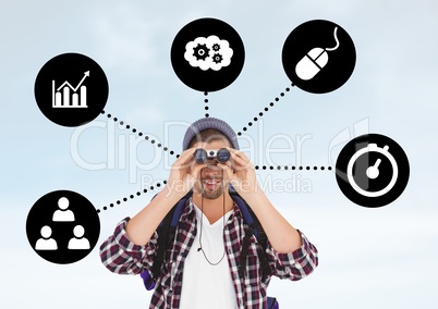 Man looking through binoculars with business icons