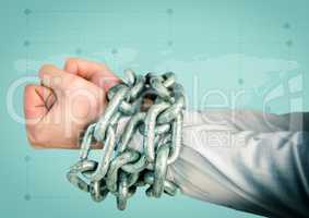 Businessman hands bound in chains