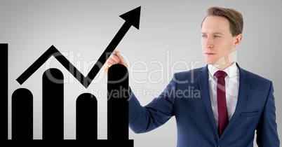 Businessman drawing a graph