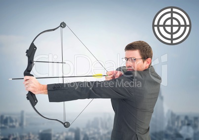 Portrait of businessman aiming with bow and arrow
