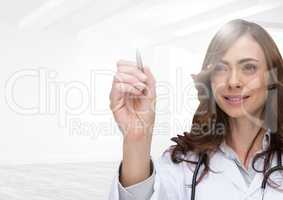 Female doctor pretending to write on invisible screen
