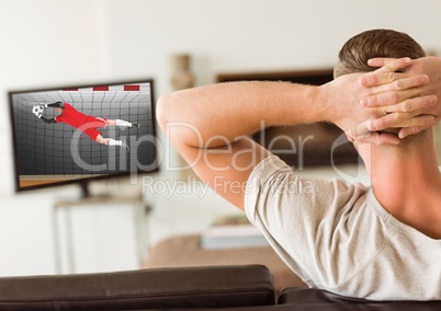 Man watching television at home
