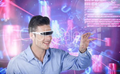 Man using virtual reality glasses against digitally generated background