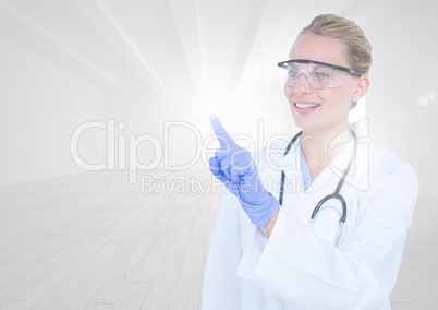 Female doctor pretending to touch an invisible object