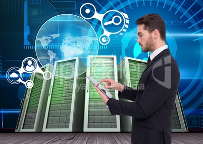 Businessman using digital tablet against data center in background
